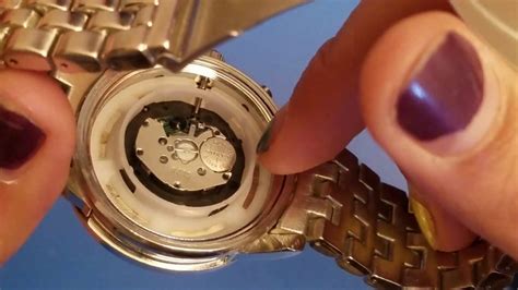 how to open michael kors watch to change battery